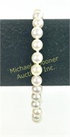 WHITE PEARL BRACELET WITH 10K GOLD HASP