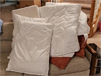 Group of bedding and pillows