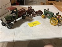 A lot of three vintage cast metal toy vehicles