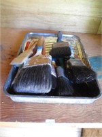 paint tray and brushes .