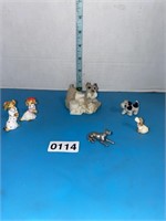 Porcelain, resin and pewter dog figurines. Chip