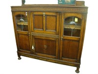 Oak, side by side cabinet with leaded glass doors