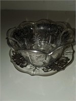 Glass bowl on saucer