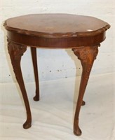 Carved Walnut scalloped edge round Table