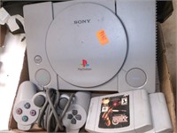SONY PLAYSTATION WITH CONTROLLER AND GAMES