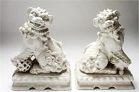 Italian Chinoiserie White-Glazed Ceramic Foo Dogs