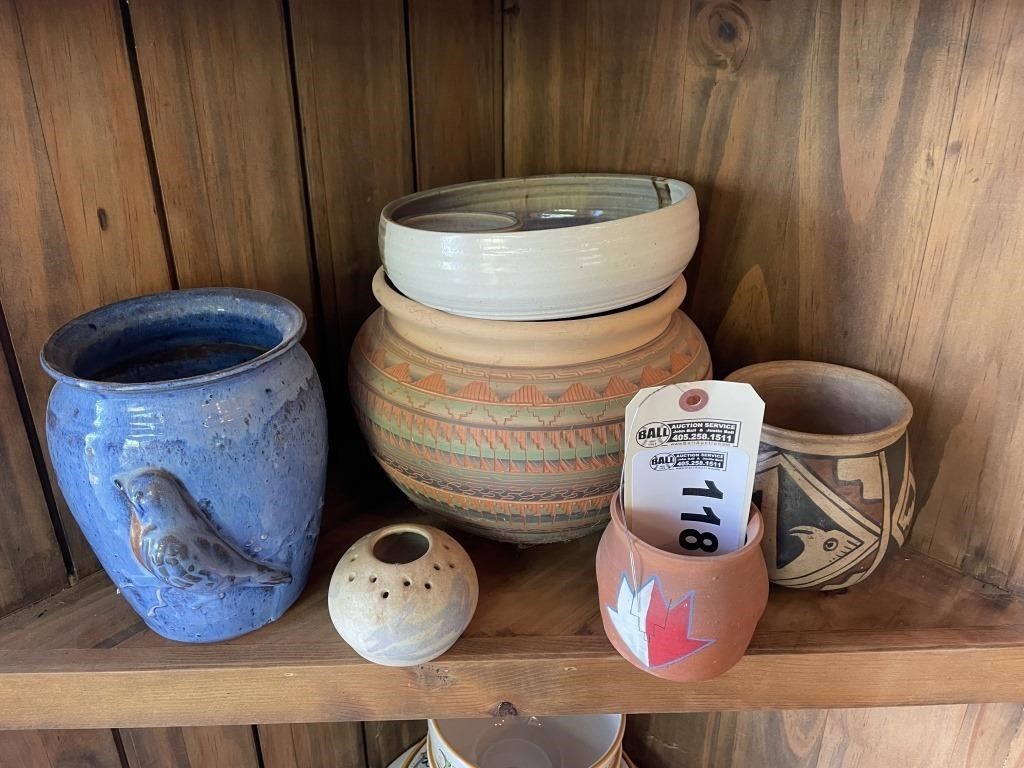 Indian style pottery pieces, some signed