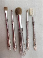 group of antique brushes