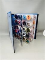 Pog collection in binder - good condition