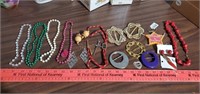 Lot of Costume Jewelry & Scarf Holders.