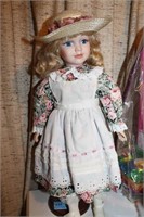 PORCELAIN DOLL ON STAND