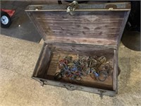 OLD TRUNK WITH METAL HORSE RINGS/BITS