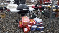 Charcoal grill with 13 bags of charcoal