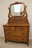 Carved oak dresser with mirror