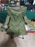 Green folding camp chair