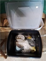 Storage tote with some miscellaneous household