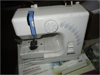 Kenmore beginner sewing machine w/flat of