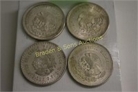 GROUP OF 4 MEXICAN SILVER DOLLARS. THESE ARE USED
