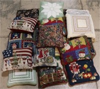 Group of assorted throw pillows