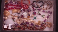 Container of costume jewelry: glass beads,