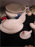 Two hens on nest and slop bowl decorated with