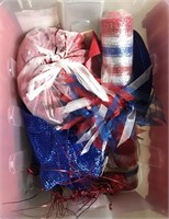 Tote of Fourth of July decorations including