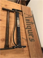 Bicycle pumps and sign
