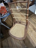 VINTAGE ROCKING CHAIFR WITH CANE SEAT
