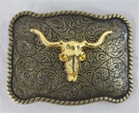 Belt buckle with longhorn and gold in color