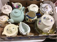 Assortment tea pots, sugar bowls