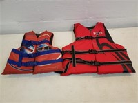 2 red life jackets: adult super large & youth size