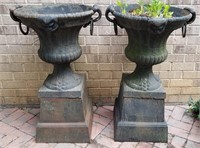 3 antique cast iron Classical form urns.