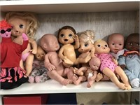 Shelf lot of plastic Dolls
