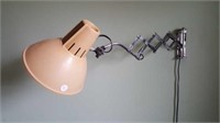 Wall hanging expandable lamp with plastic shade