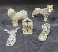 Pewter dogs and children.