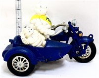 Cast iron Michelin man on motorcycle