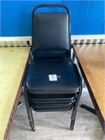 4 black stack dining chairs