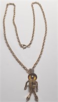 GOLD TONE PERSON W/ MOVABLE ARMS NECKLACE