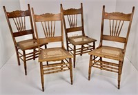 6 oak side chairs, spindle backs, cane seats