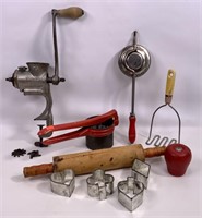 Kitchen items - meat grinder, rolling pin, potato