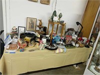 Table Lot Of Household Items Vacuum Cleaner As