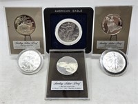 3 Silver Eagles  b; 3 Sterling Medals