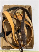 Leather belts and a rifle sling