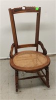 Wood rocker with cane seat