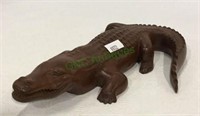 Carved wooden alligator measuring 9 inches long.