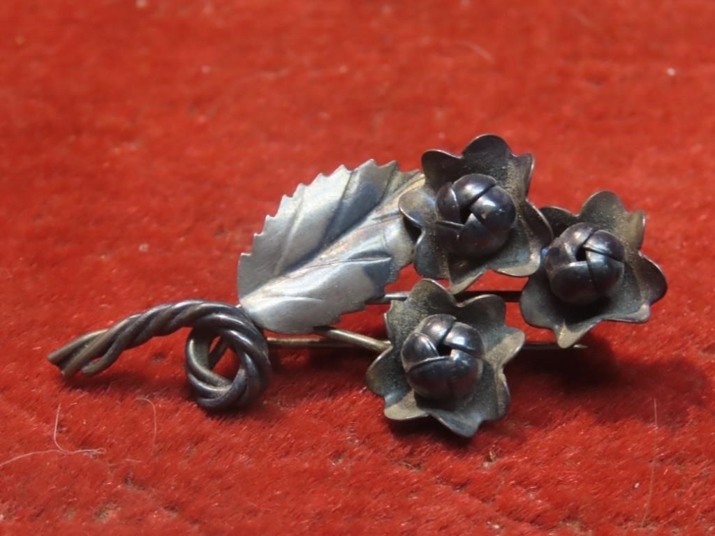 Sterling silver flower broach pin.