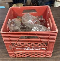 Red Plastic Superbrand Crate with old Jars.