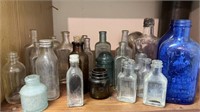 Hemingway insulator, vintage glass bottles, blue,
