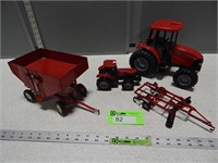 Toy tractors (plastic), wagon and disc