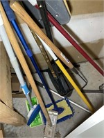 GROUP OF MOPS BROOMS DUSTPANS